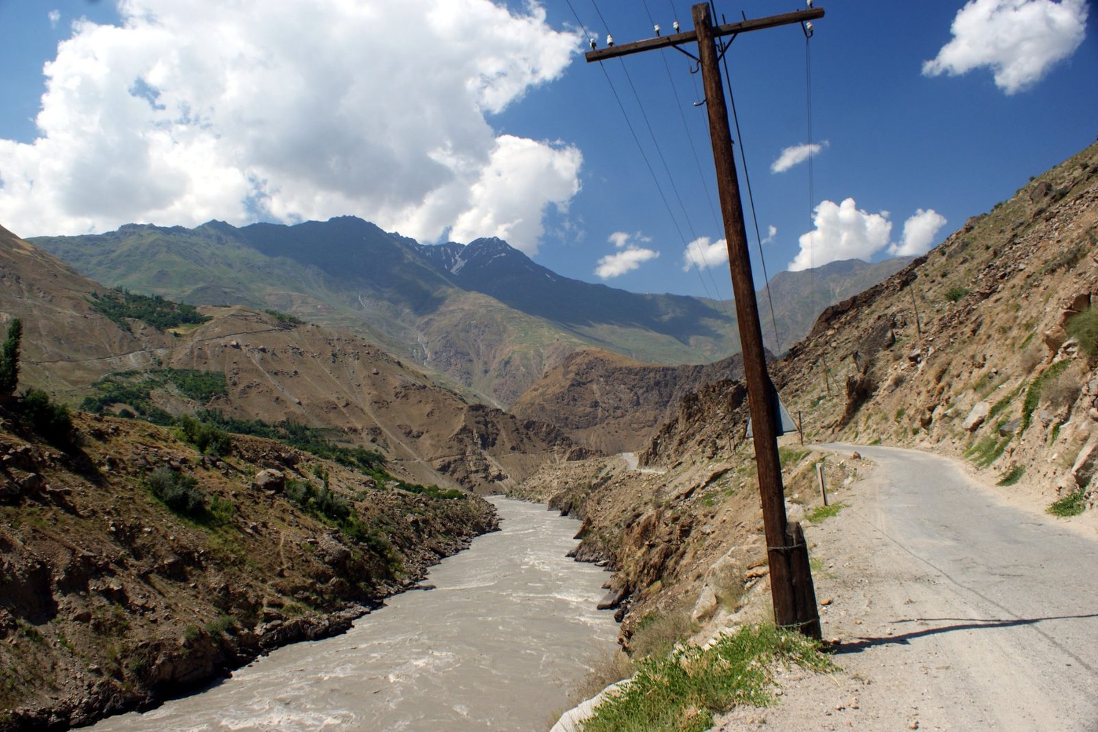 The Pamir Highway running beside the Panj river between Kalai-Khumb and Khorog, Tajikistan