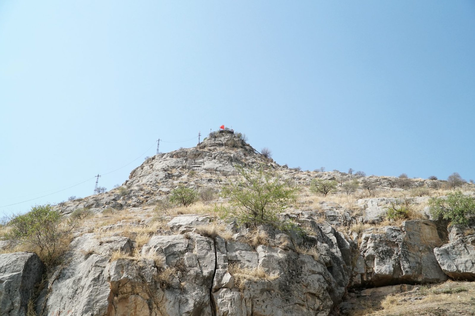 Sulaiman-Too sacred mountain rising above the city of Osh, Kyrgyzstan