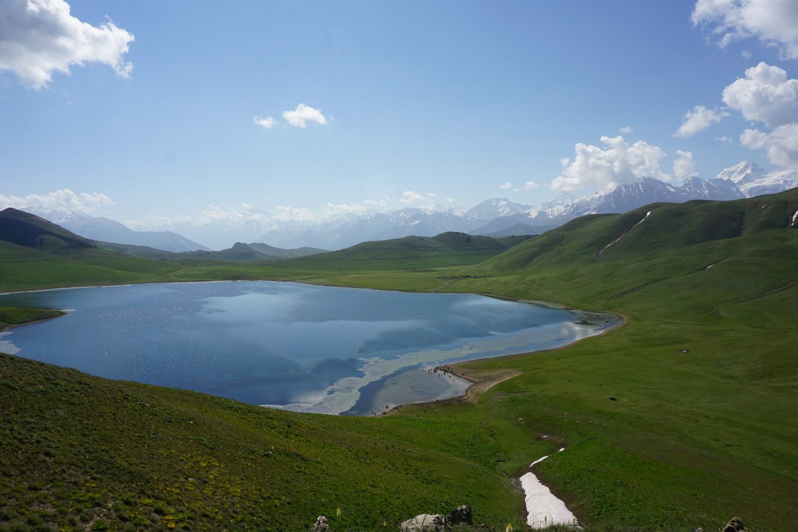 A mountain lake among high peaks in Tajikistan